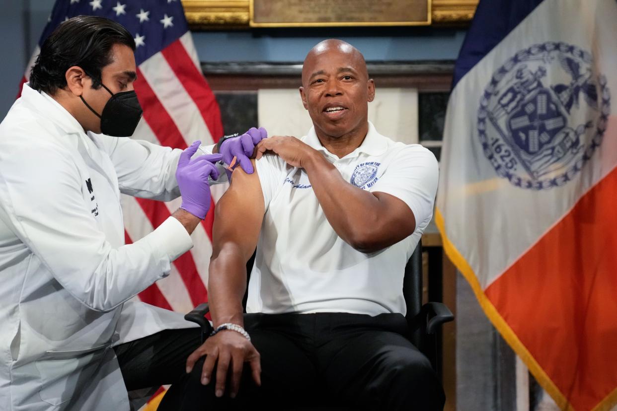 New York City Mayor Eric Adams receives his second COVID-19 booster shot at City Hall on Tuesday, September 20, 2022.