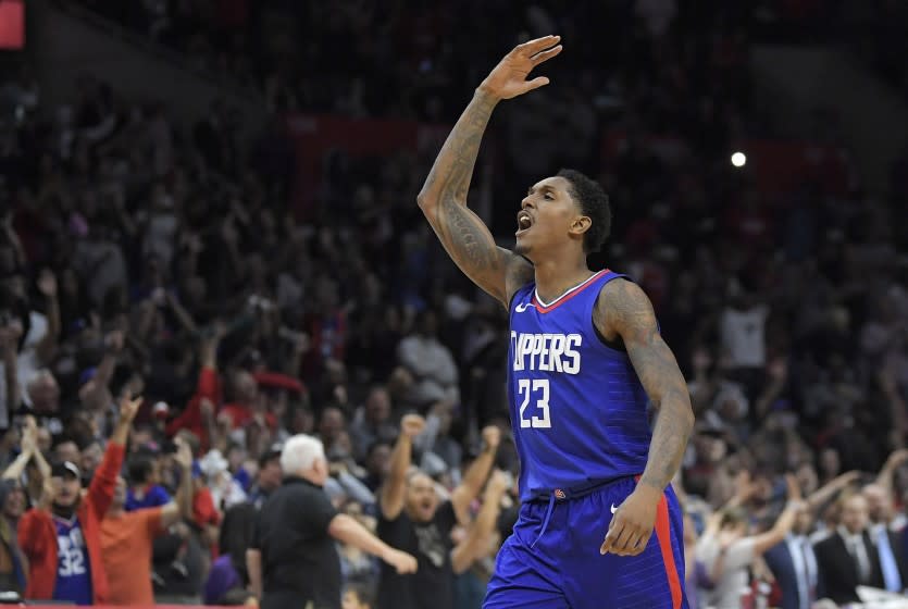 Los Angeles Clippers guard Lou Williams celebrates after scoring late in the second half of an NBA basketball game against the Washington Wizards, Saturday, Dec. 9, 2017, in Los Angeles. The Clippers won 113-112. (AP Photo/Mark J. Terrill)
