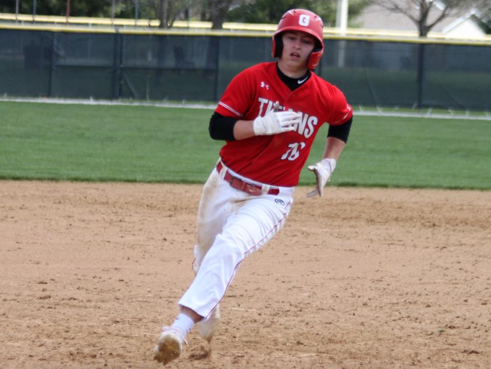 Chatham Glenwood senior shortstop Nolan McMasters runs to third base during a regular season game against Quincy Notre Dame at Bob Erickson Field on Saturday, April 9.