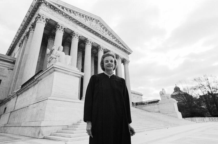 Newly appointed Supreme Court Justice Sandra Day O'Connor stands in front of the US Supreme Court Building following her swearing in on Sept. 25, 1981 in Washington, DC.