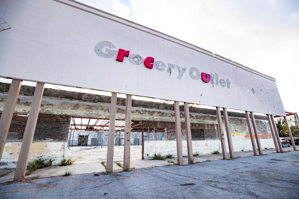 The former site of the Grocery Outlet in Millville sits empty with only three letters remaining on its sign. The store was heavily damaged by Hurricane Michael in 2018.