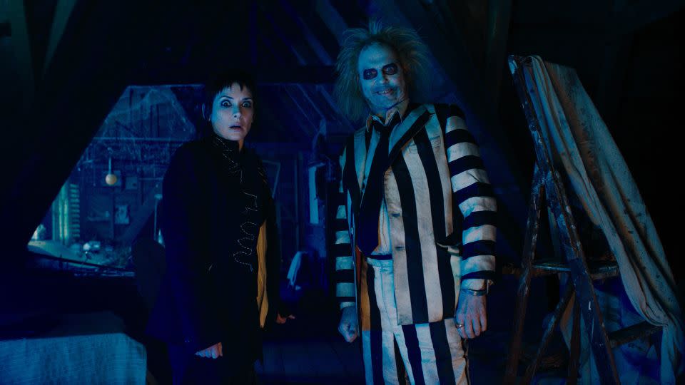 Beetlejuice's striped suit went through a pain-staking ageing process, to signal another 35 years spent in the underworld. - Warner Brothers Discovery