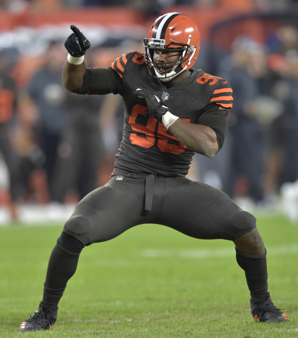 FILE - In this Sept. 20, 2018, file photo, Cleveland Browns defensive end Myles Garrett (95) celebrates a sack during an NFL football game against the New York Jets, in Cleveland. General manager John Dorsey has revamped the Cleveland Browns roster. From hopeless to hopeful. Finally. (AP Photo/David Richard, File)