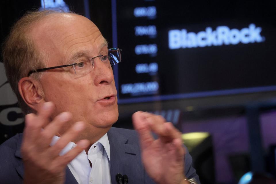 Larry Fink, Chairman and CEO of BlackRock, gesturing and speaking during an interview with CNBC on the floor of the New York Stock Exchange (NYSE) in New York City, U.S., April 14, 2023.