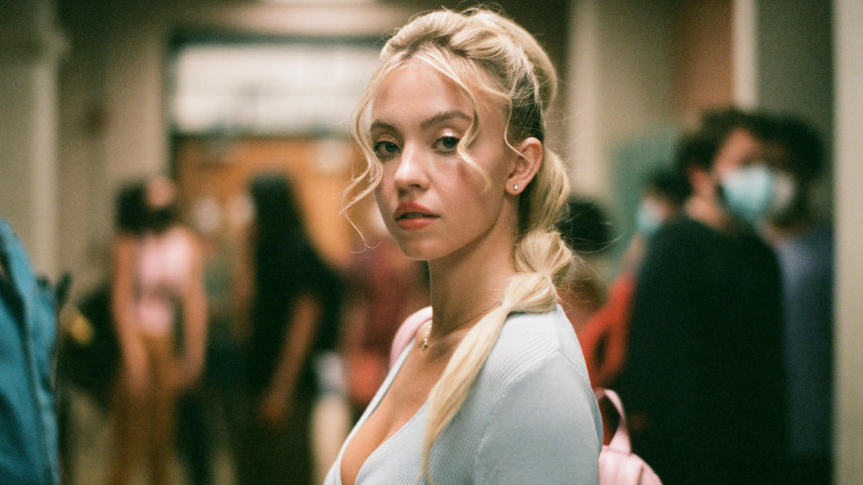  Sydney Sweeney as Cassie, in the hallway of the high school in a promotional photo for Euphoria season 2 