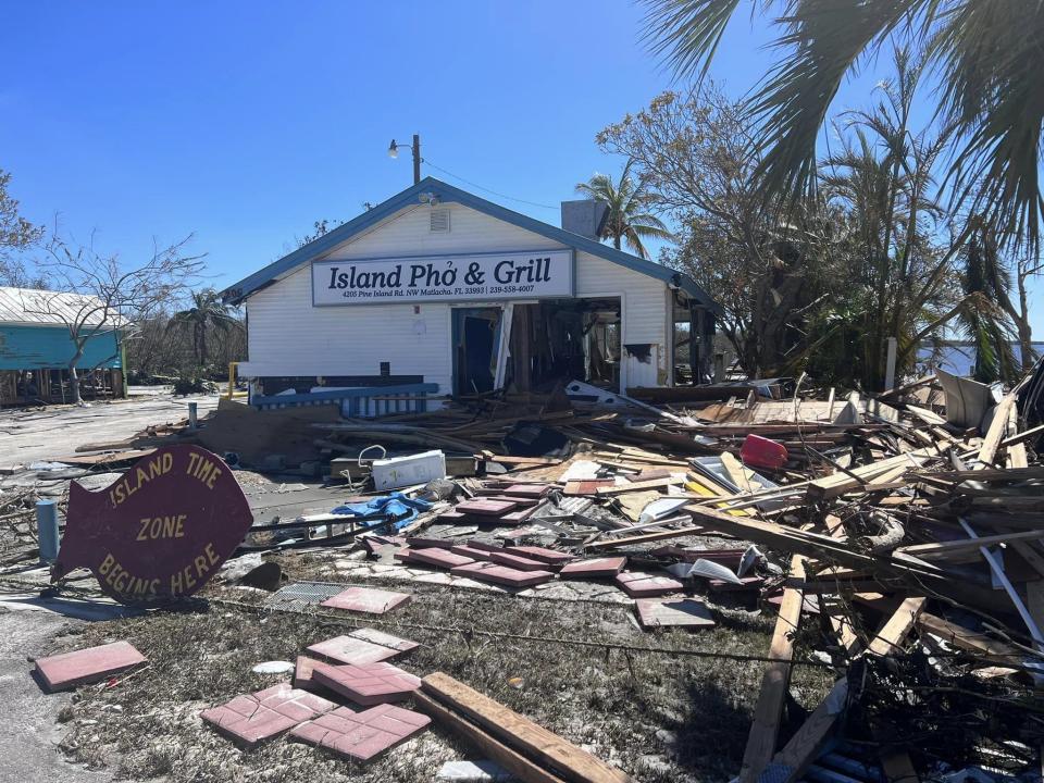 A damaged restaurant on the island of Matlacha, Florida, with debris scattered across the outside on Sept. 30, 2022. / Credit: Lee County Sheriff's Office