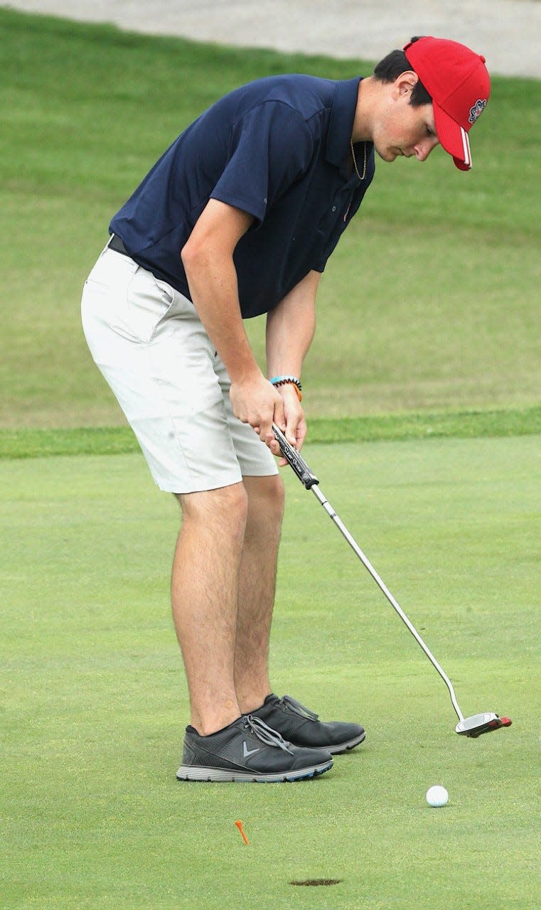 BNL senior Dylan Endris strokes a short putt Saturday at Otis Park during the HHC Match. The Stars repeated as champions.