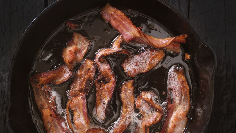 top down view of bacon frying