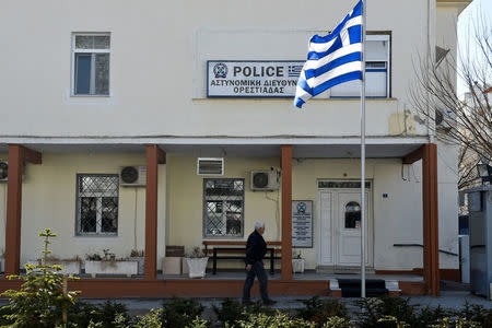 A man walks past the Police headquarters of the northern city of Orestiada, Greece, February 24 2017. REUTERS/Alexandros Avramidis