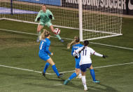 U.S. forward Sophia Smith (11) takes a shot past Iceland defenders Elisa Vidarsdottir (3) and Gudrun Arnardottir (18) as goalkeeper Cecilia Ran Runarsdottir (13) prepares to make the save during the second half of a SheBelieves Cup soccer match Wednesday, Feb. 23, 2022, in Frisco, Texas. The United States won 5-0. (AP Photo/Jeffrey McWhorter)