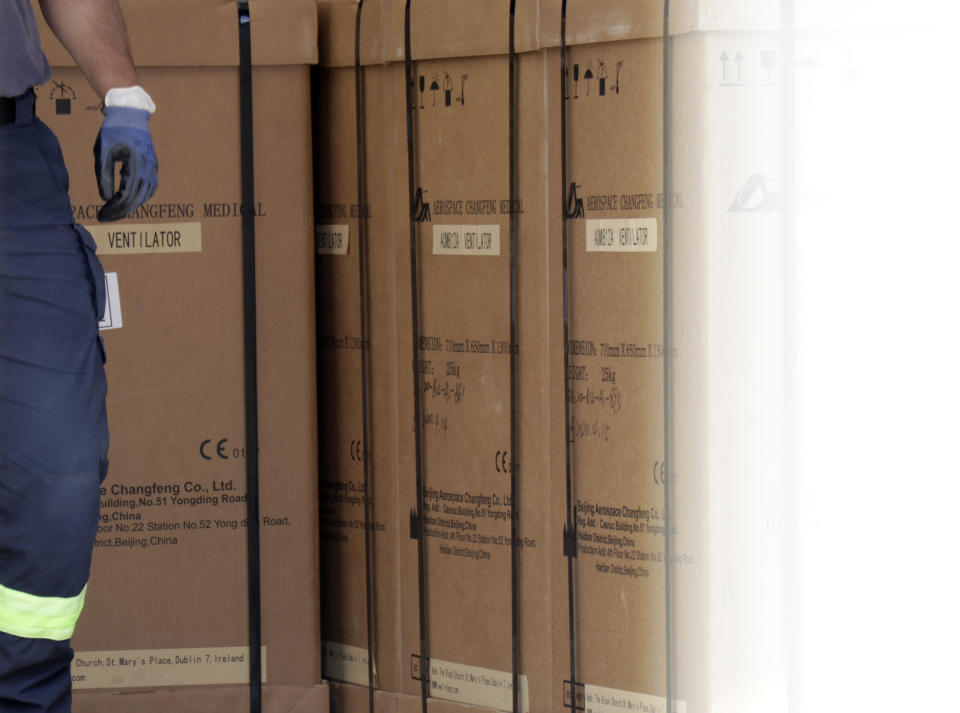 Civil protection workers move boxes of ventilators at the customs post in the Bosnia capital Sarajevo, Thursday, April 30, 2020. In their initial report, the Bosnian state prosecutors said in a statement released Monday May 11, 2020, that the ventilators imported from China by private company Silver Raspberry, and paid for by the country’s government, have been found to be useless for COVID-19 coronavirus patients. (AP Photo)