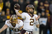 Minnesota quarterback Tanner Morgan (2) throws a pass during the second half of an NCAA college football game against Iowa, Saturday, Nov. 13, 2021, in Iowa City, Iowa. Iowa won 27-22. (AP Photo/Charlie Neibergall)