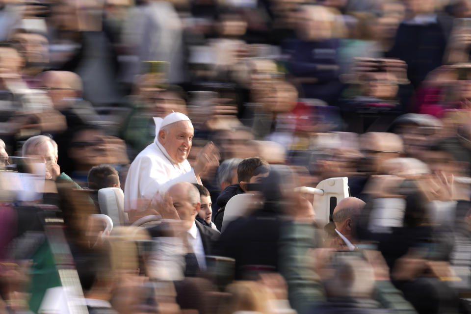 Pope Francis arrives for his weekly general audience in St. Peter's Square, at the Vatican, Wednesday, Nov. 22, 2023. (AP Photo/Andrew Medichini)