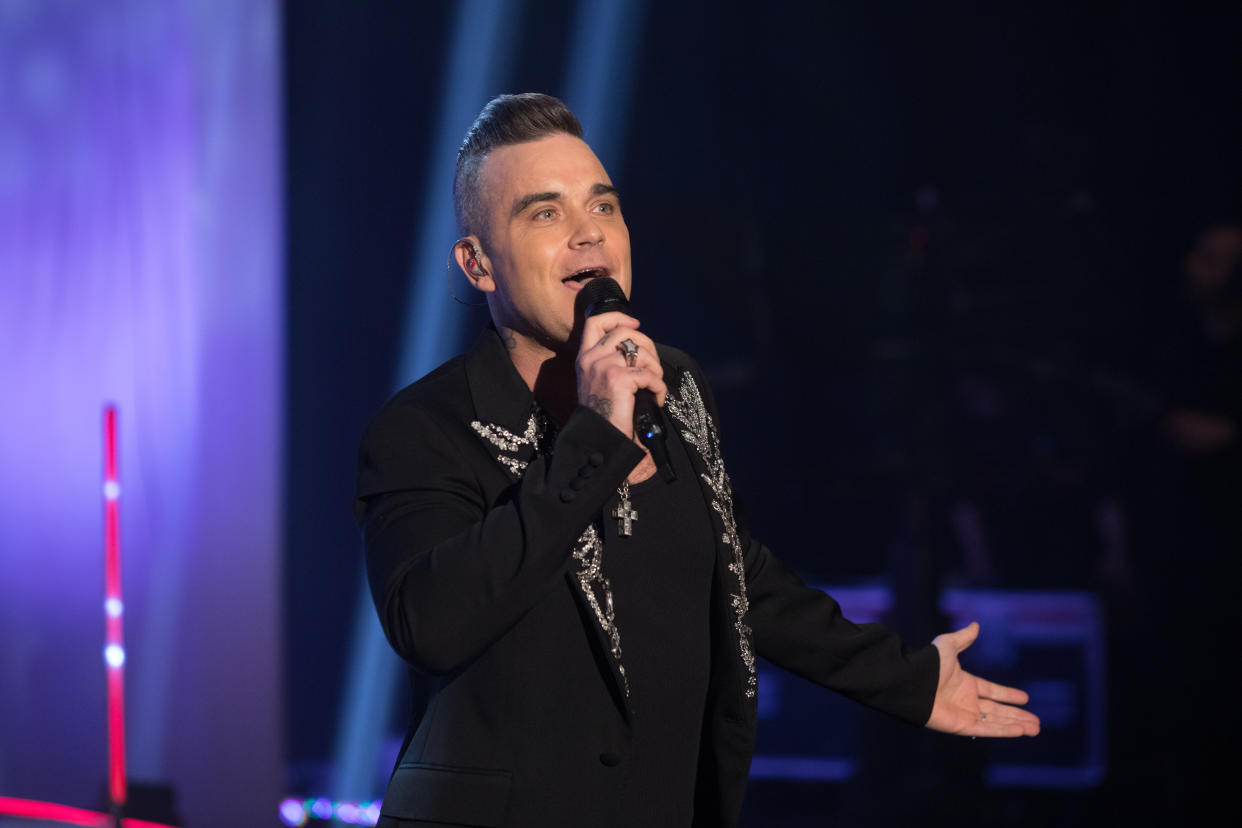 Robbie Williams performs during the filming for the Graham Norton Show at BBC Studioworks 6 Television Centre, Wood Lane, London, to be aired on BBC One on Friday evening. Picture date: Thursday December 19, 2019. Photo credit should read: PA Images on behalf of So TV (Photo by David Parry/PA Images via Getty Images)