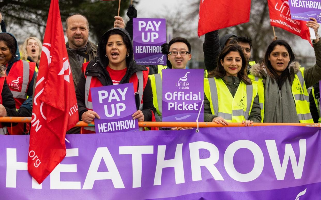 Security workers on a picket line at the start of a 10-day strike at Heathrow Airport - Chris Ratcliffe/Bloomberg