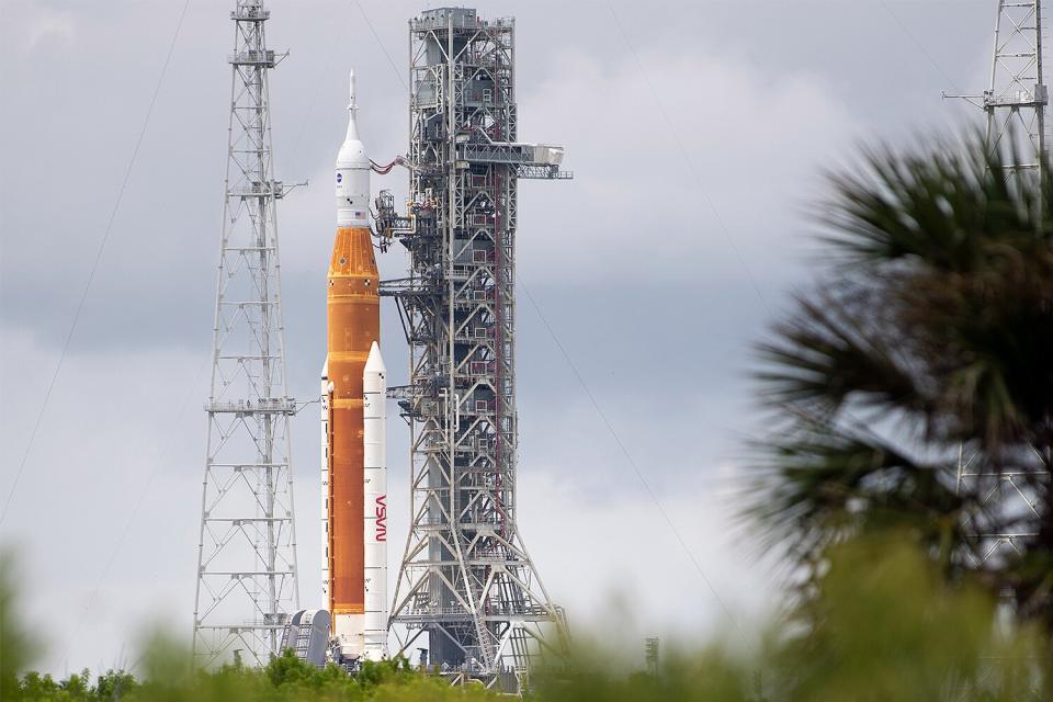 In this handout image provided by NASA, NASA's Space Launch System (SLS) rocket with the Orion spacecraft aboard is seen atop a mobile launcher at Launch Pad 39B as preparations for launch continue at NASA's Kennedy Space Center on August 28, 2022, in Cape Canaveral, Florida. NASA's Artemis I flight test is the first integrated test of the agencys deep space exploration systems: the Orion spacecraft, SLS rocket, and supporting ground systems. Launch of the uncrewed flight test is targeted for no earlier than Aug. 29 at 8:33 a.m. ET.