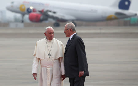 Pope Francis is greeted by Peru's President Pedro Pablo Kuczynski as he arrives in Lima, Peru, January 18, 2018. REUTERS/Alessandro Bianchi