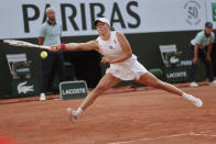 Poland's Iga Swiatek plays a shot against Brazil's Beatriz Haddad Maia during their semifinal match of the French Open tennis tournament at the Roland Garros stadium in Paris, Thursday, June 8, 2023. (AP Photo/Jean-Francois Badias)