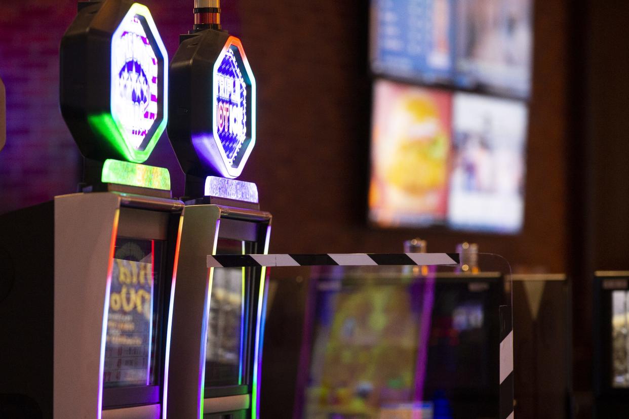 Plexiglas is placed around slot machines, gaming tables, and other areas at the Lone Butte Casino in Chandler on May 14, 2020. Casinos under the Gila River Indian Community were planning to reopen during the COVID-19 pandemic with new safety measures on May, 2020.