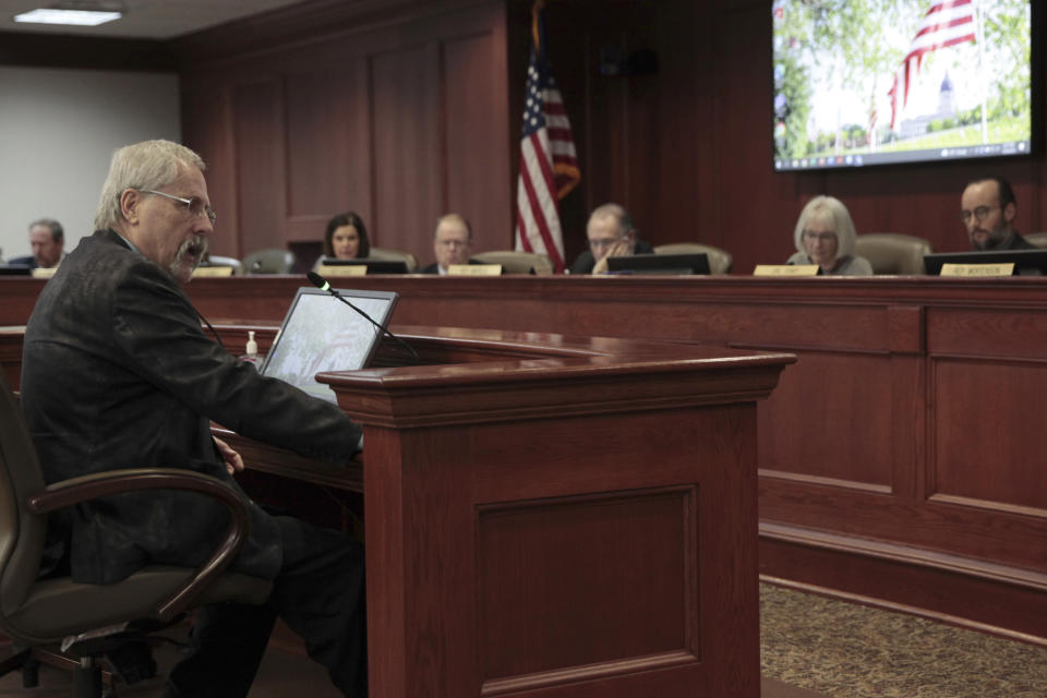 South Dakota state Rep. Phil Jensen, a Republican, testifies in support of his resolution that would express sympathy for those facing charges in the Jan. 6, 2021, riot at the U.S. Capitol on Wednesday, Jan. 25, 2023, in Pierre, S.D. (AP Photo/Amancai Biraben)