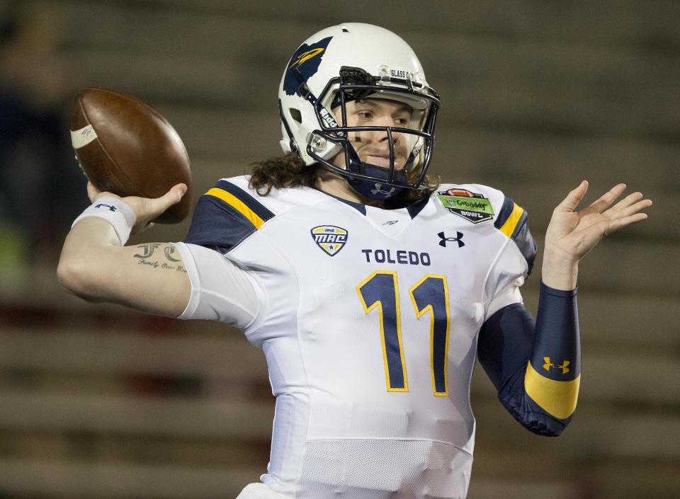 Toledo quarterback Logan Woodside is on the radar of NFL scouts. (AP Photo/Brynn Anderson, File)