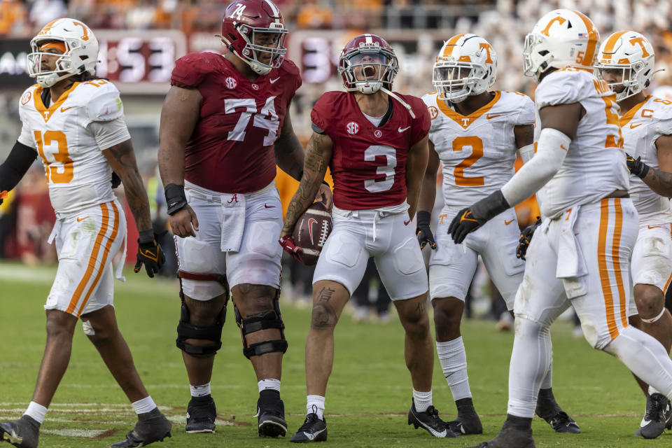 Alabama wide receiver Jermaine Burton (3) celebrates his first down catch during the second half of an NCAA college football game against Tennessee, Saturday, Oct. 21, 2023, in Tuscaloosa, Ala. Also pictured is Alabama offensive lineman Kadyn Proctor (74). (AP Photo/Vasha Hunt)