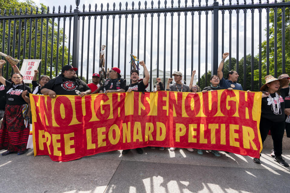 People gather for a rally outside of the White House in support of imprisoned Native American activist Leonard Peltier, Tuesday, Sept. 12, 2023, in Washington. (AP Photo/Stephanie Scarbrough)