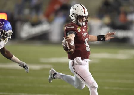 Dec 22, 2018; Mobile, AL, United States; Troy Trojans quarterback Sawyer Smith (3) scrambles up the field for yardage against the Buffalo Bulls during the third quarter of the 2018 Dollar General Bowl at Ladd-Peebles Stadium. Mandatory Credit: John David Mercer-USA TODAY Sports