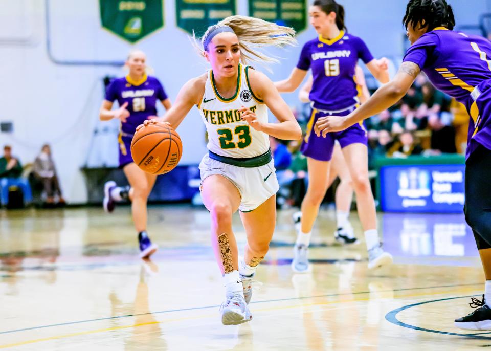 Emma Utterback drives into the paint during the University of Vermont women's basketball game against the University at Albany at Patrick Gymnasium on Feb. 4, 2023.