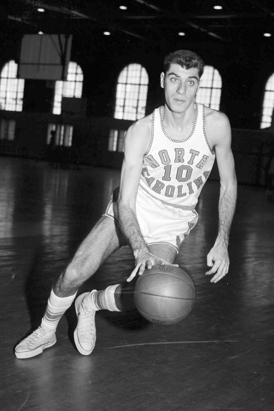FILE - North Carolina basketball star Lennie Rosenbluth is shown during a practice session Feb. 27, 1957, location not known. Rosenbluth, who led North Carolina to its first basketball NCAA title in 1957 with a victory over Wilt Chamberlain and Kansas in the championship game, died Saturday, June 18, 2022. He was 89. (AP Photo/File)