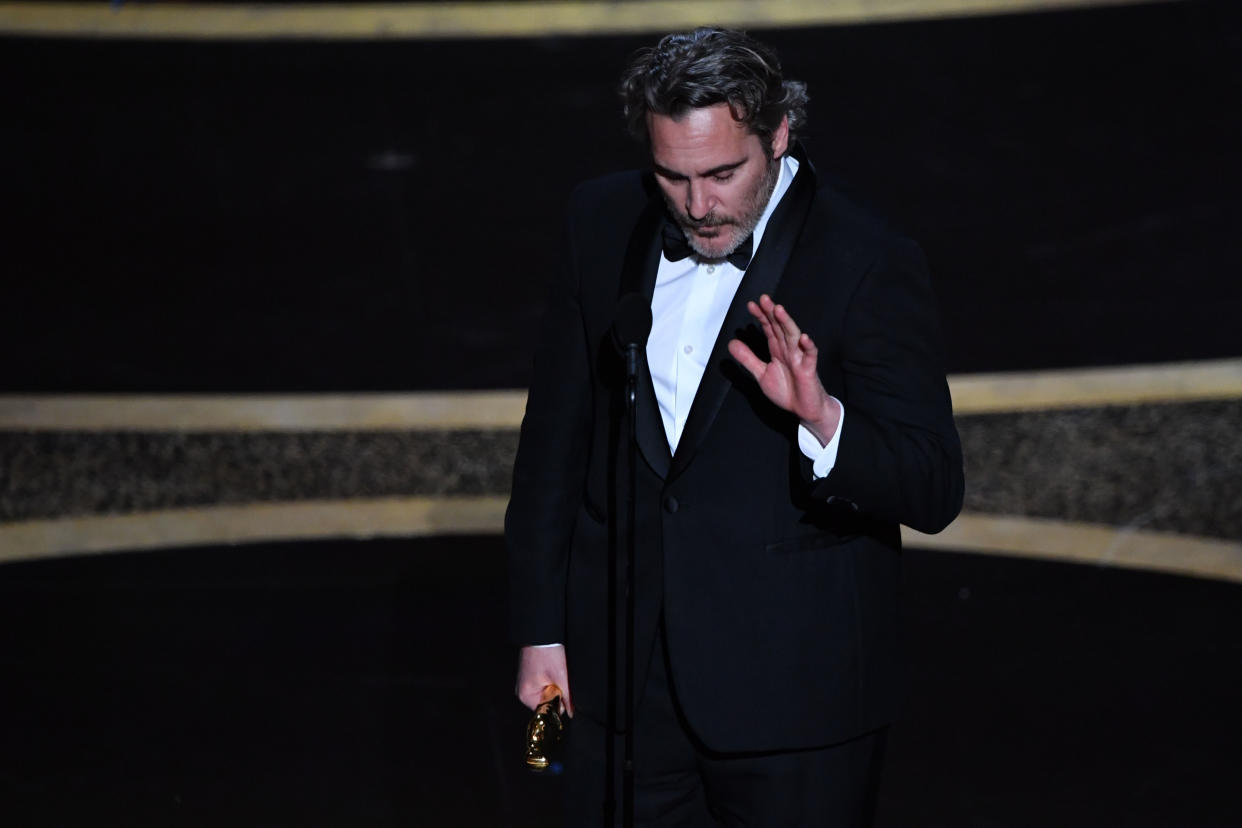 US actor Joaquin Phoenix accepts the award for Best Actor in a Leading Role for "Joker" onstage during the 92nd Oscars at the Dolby Theatre in Hollywood, California on February 9, 2020. (Photo by Mark RALSTON / AFP) (Photo by MARK RALSTON/AFP via Getty Images)