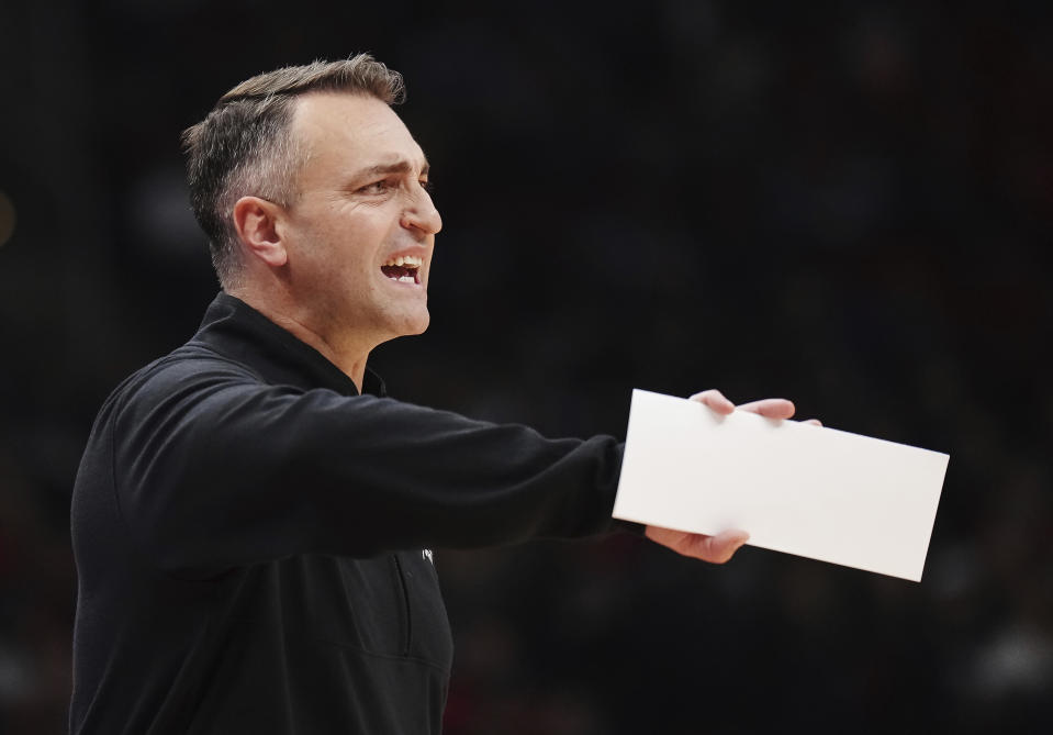 Toronto Raptors head coach Darko Rajakovic instructs his team during the first half of an NBA basketball game against the Minnesota Timberwolves in Toronto on Wednesday, Oct. 25, 2023. (Nathan Denette/The Canadian Press via AP)