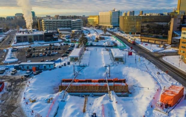 Construction is ongoing at the Carleton University Trillium Line station. The contractor told the city in January that it was 116 days behind schedule, which could push the rail system reopening into 2023.