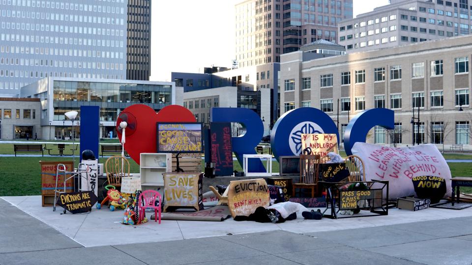 On Tuesday morning, the City-Wide Tenant Union of Rochester made a public demonstration and art installation to call for statewide Good Cause Eviction Protections. The public art protest was held at the "I Love ROC sign at Parcel 5."