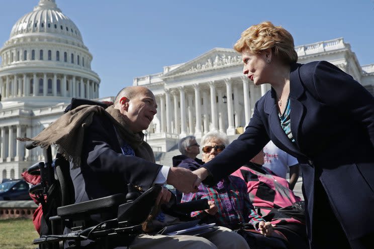 Sen. Debbie Stabenow, D-Mich., right, thanks Kent Keyser following a news conference with people who may be negatively affected by the proposed American Health Care Act, the Republicans' attempt to repeal and replace the Affordable Care Act, March 9, 2017 on Capitol Hill in Washington. (Photo: Chip Somodevilla/Getty Images)