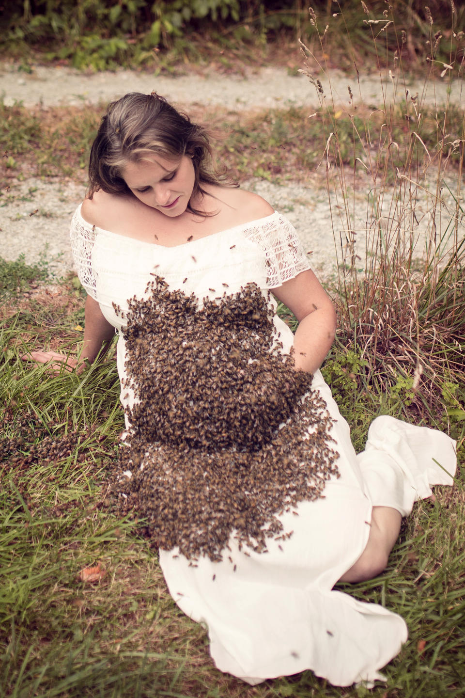 <p>“We cut the branch and my husband walked it over to where I was sitting for the pictures.” (Photo: SWNS) </p>