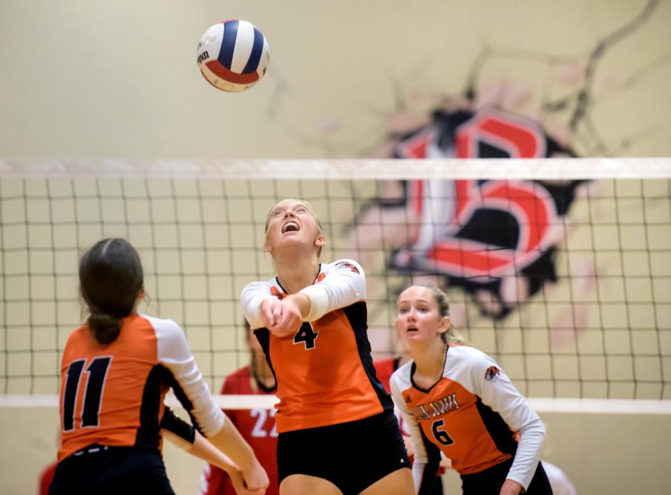 Illini Bluffs' Reese Cruit (4) bumps the ball against Brimfield in the third set of their volleyball match Thursday, Sept. 21, 2023 at Brimfield High School. Illini Bluffs defeated Brimfield in three sets 17-25, 25-19 and 25-18.