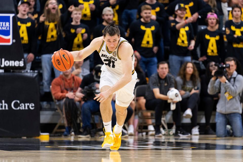 Missouri's Caleb Grill brings the ball up court during the second half of an NCAA college basketball game against Arkansas-Pine Bluff Monday, Nov. 6, 2023, in Columbia, Mo. Missouri won 101-79. (AP Photo/L.G. Patterson)