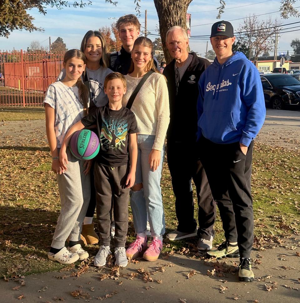 College of the Sequoias men's basketball head coach Dallas Jensen, far right, and his family pose for a photo; pictured, left to right: Palmer (daughter), Kim (wife), Otis (son), Zander (son), Aaliyah (daughter) and Kort (grandpa).