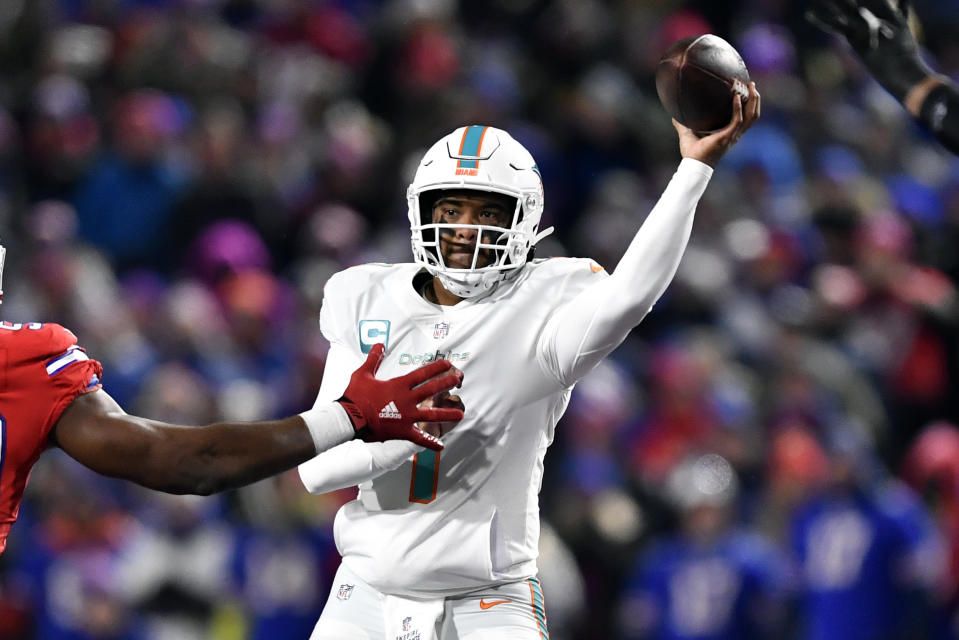 FILE - Miami Dolphins quarterback Tua Tagovailoa throws a pass during the first half of the team's NFL football game against the Buffalo Bills in Orchard Park, N.Y., Dec. 17, 2022. Miami made the playoffs despite starting three different quarterbacks with Tagovailoa, Teddy Bridgewater and rookie Skylar Thompson each starting at least two games during the regular season. (AP Photo/Adrian Kraus, File)