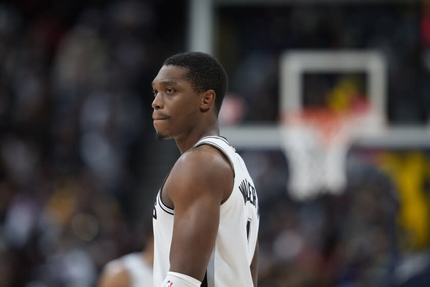 San Antonio Spurs guard Lonnie Walker IV (1) in the first half of an NBA basketball game.