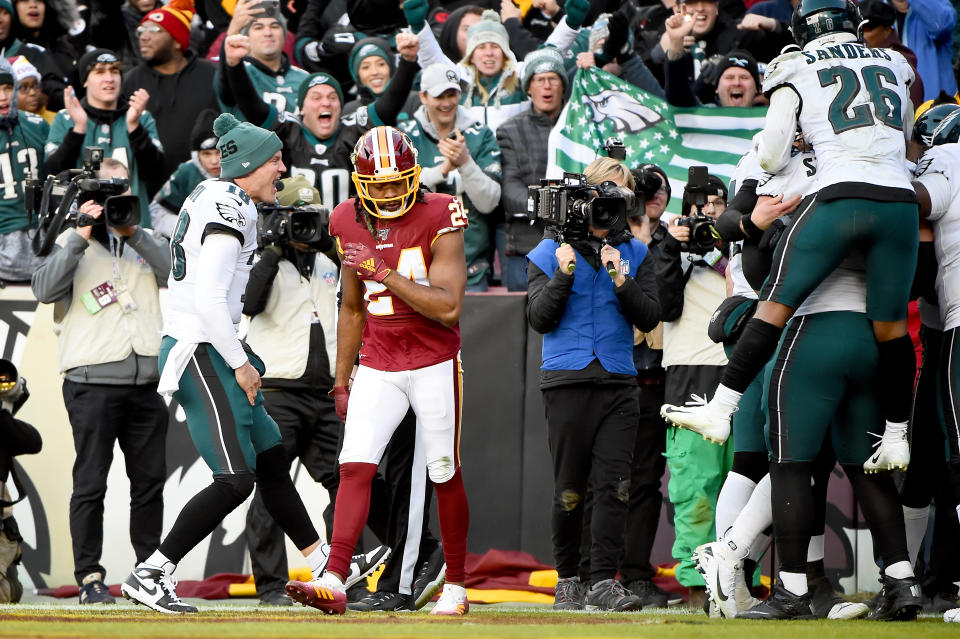 Josh Norman of the Washington Redskins reacts as Greg Ward of the Philadelphia Eagles celebrates his touchdown during the second half at FedExField on Sunday in Landover, Maryland.