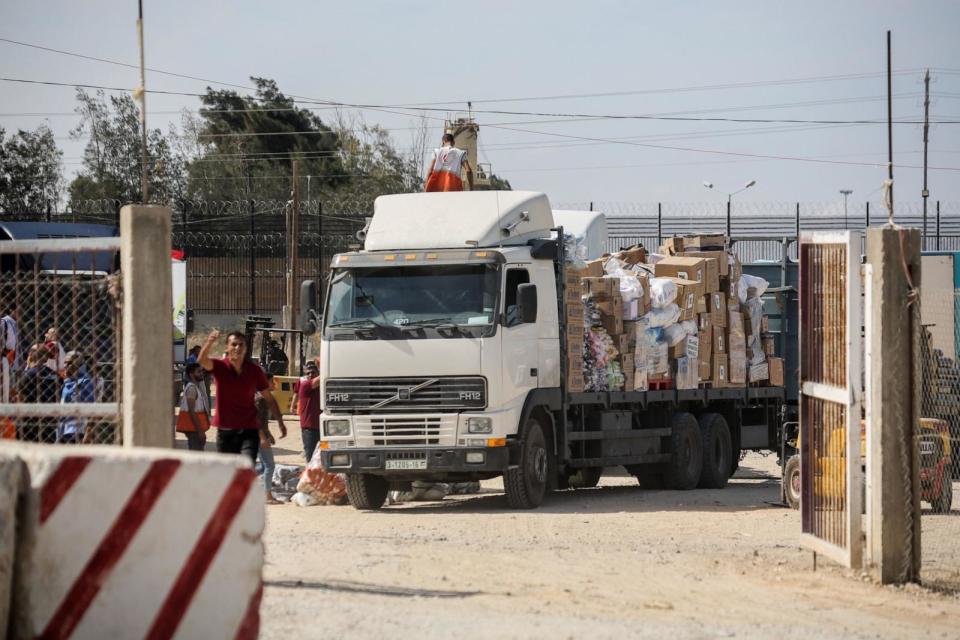 PHOTO: The entry of humanitarian aid arrives through the Rafah land crossing into the Gaza Strip, Oct. 21, 2023, in Rafah, Gaza. (Ahmad Hasaballah/Getty Images)