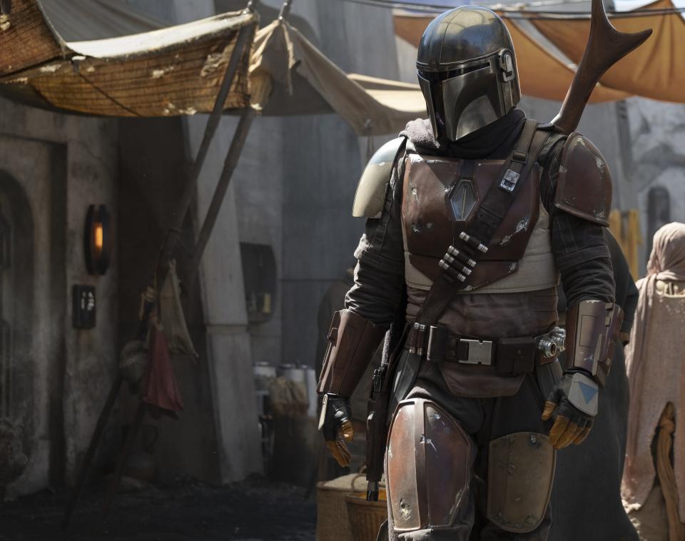 Pedro Pascal stars as the helmeted galactic gunslinger in "The Mandalorian," the first live-action "Star Wars" TV series.