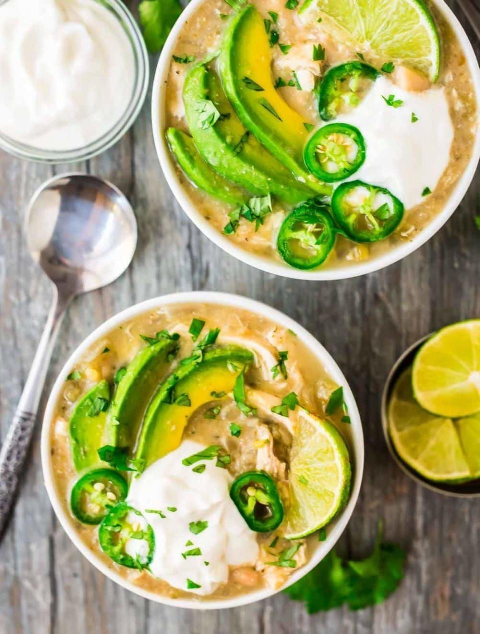 <strong>Get the <a href="https://www.wellplated.com/crockpot-white-chicken-chili/" target="_blank">Crockpot White Chicken Chili </a>recipe from Well Plated</strong>