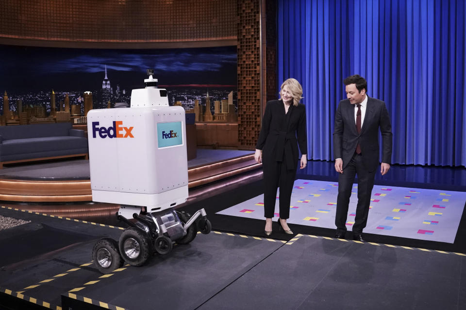 THE TONIGHT SHOW STARRING JIMMY FALLON -- Episode 1023 -- Pictured: (l-r) A FedEx delivery Robot, FedEx representative Bree Carere, and host Jimmy Fallon during "Tonight Showbotics" on February 26, 2019 -- (Photo by: Andrew Lipovsky/NBC/NBCU Photo Bank via Getty Images)