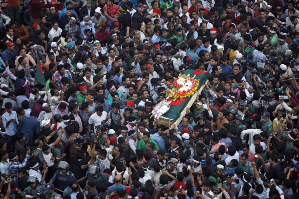 <span class="caption">In this 2013 photo, Bangladeshi mourners carry the coffin containing the body of blogger Ahmed Rajib Haider for funeral.</span> <span class="attribution"><a class="link " href="http://www.apimages.com/metadata/Index/Bangladesh-Bloggers-Murder/6f51046dcd5b4f948ed5303b5acf79b6/17/0" rel="nofollow noopener" target="_blank" data-ylk="slk:AP Photo/Pavel Rahman, File;elm:context_link;itc:0;sec:content-canvas">AP Photo/Pavel Rahman, File</a></span>