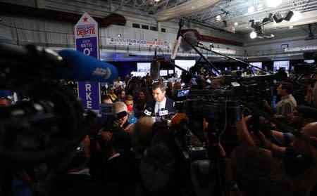 Former Rep. Beto O'Rourke talks in the spin room after the 2020 Democratic U.S. presidential debate in Houston