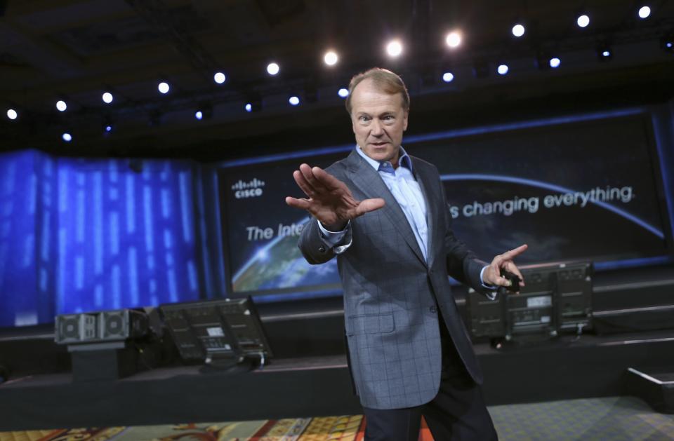 Cisco CEO John Chambers gestures while delivering his keynote speech at the annual Consumer Electronics Show (CES) in Las Vegas