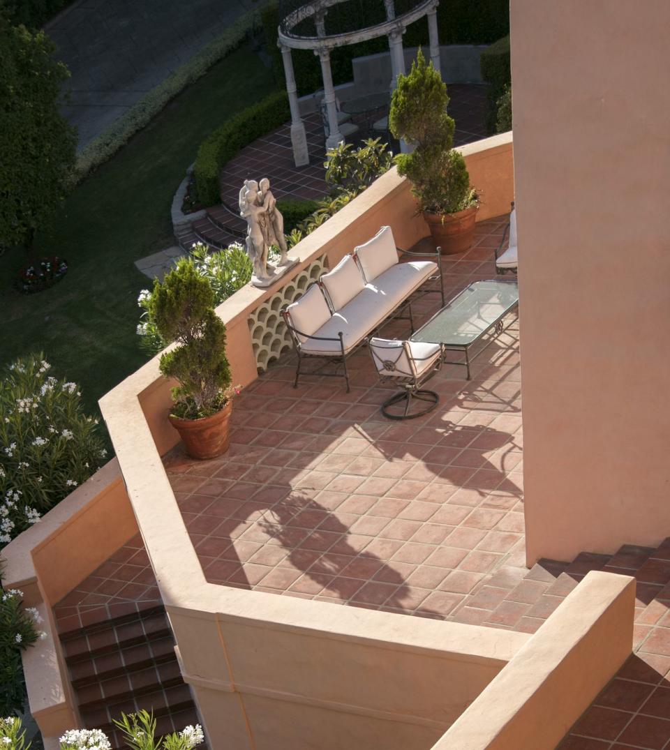The terrace staircase offers easy access to the pool.